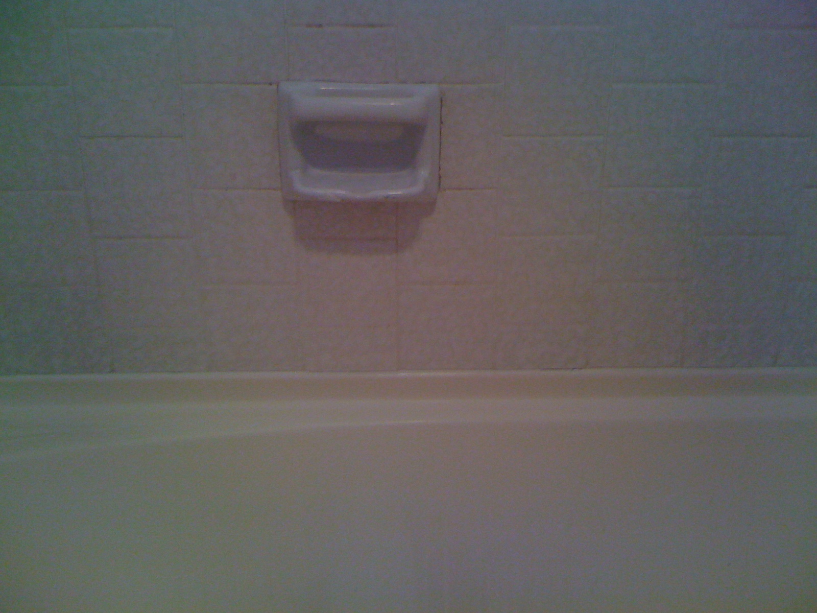 after photo of bathtub caulking